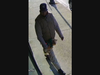 A man pictured above is accused of stealing a secured dog from outside of a home, police say. 