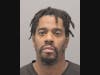 Andre Wilson is accused of having several illegal drugs in his possession and a loaded gun in his vehicle, police say. 