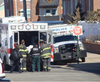 A construction worker is placed in an ambulance after a rescue in Long Beach. 