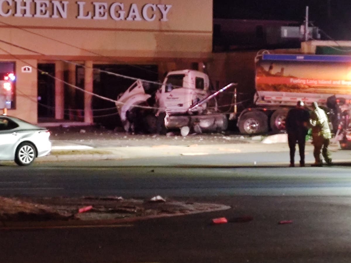 A tanker truck crashed into a Merrick shop Monday morning. 