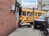 A school bus slammed into a building on Merrick Avenue. 