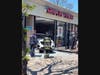 A car rammed into a fitness shop on Merrick Road. 