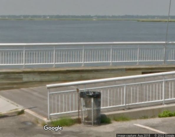A body was found floating off a Long Beach pier on Thursday morning. 