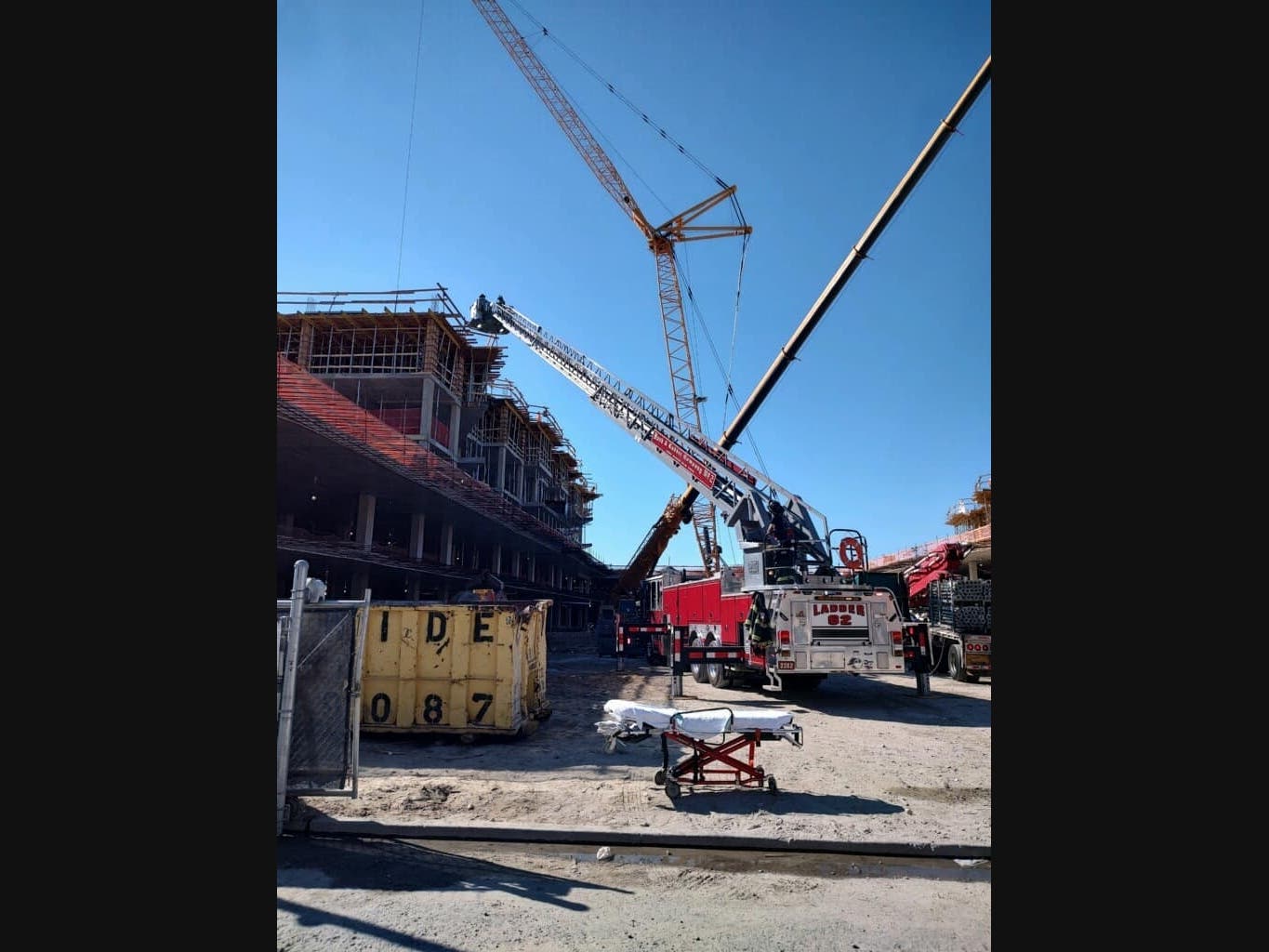 A crane was used on Thursday morning to bring an injured construction worker safely to the ground, the Long Beach Fire Department said.