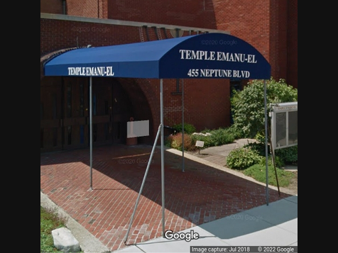 The rabbi at Temple Emanu-El has COVID-19. 