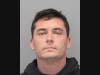 Ilya Ostrovskiy​ is accused of storing numerous weapons and ammunition in his Hewlett Harbor home. 