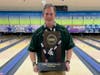 Coach Todd Rubin holding the 3rd place state trophy.