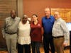 Johnathan Robinson, Employee of the Month at White Plains Linen and participant in the CBS Supported Employment program, stands with his mom, Nellie, HR Director of White Plains Linen, Job Developer Joe Conti and Dan Kaufman of White Plains Linen