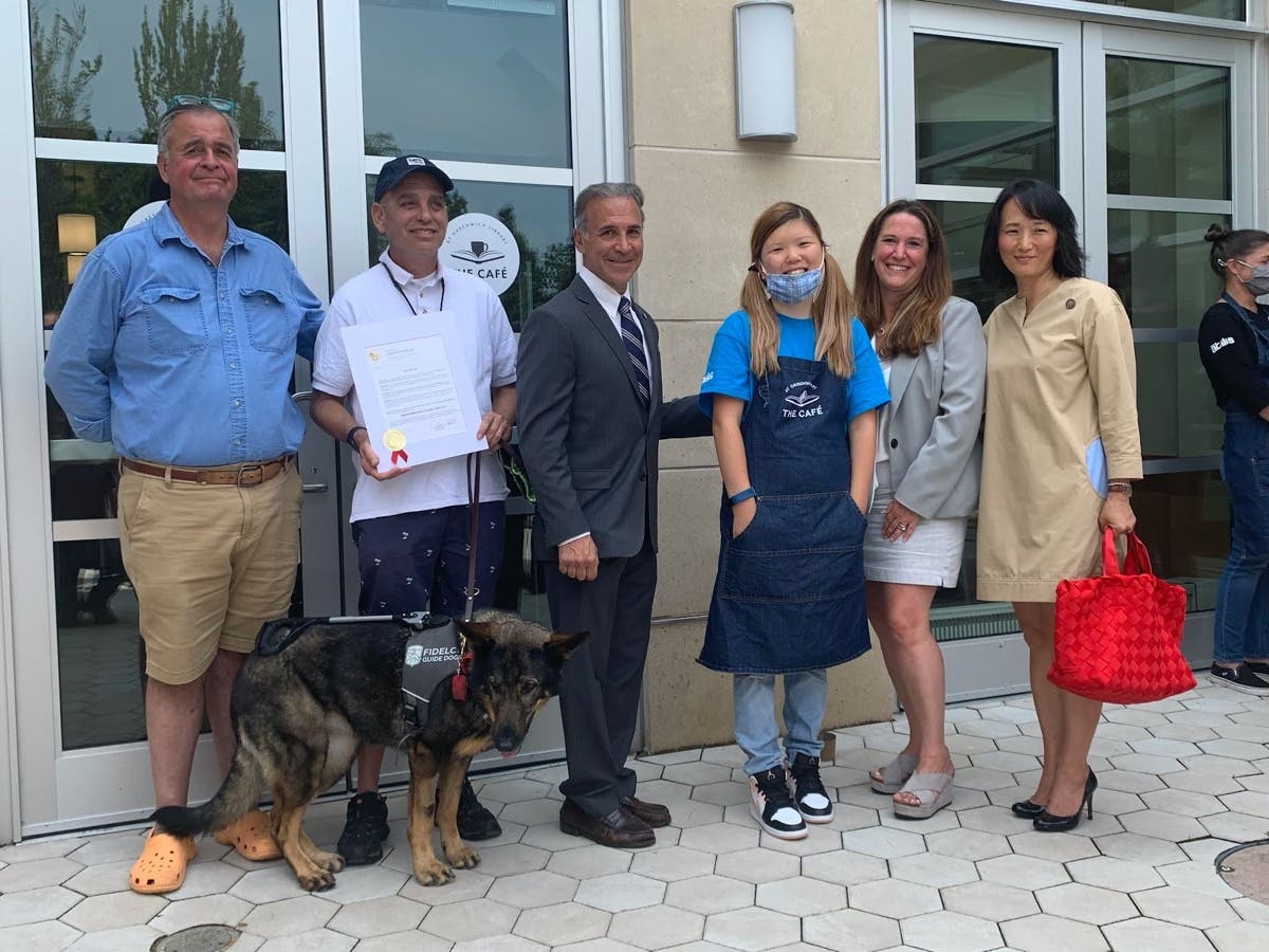 Left to right: State Rep. Stephen Meskers, advocate for people with disabilities Alan Gunzburg, First Selectman Fred Camillo, Library Cafe employee Michelle Yoon, Abilis President and CEO Amy Montimurro, State Rep. Kimberly Fiorello.