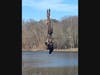 The owl was found suspended in fishing line about 15 feet above the South Stanwich Reservoir in the backcountry of Greenwich.