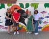 From left to right: Muralist Suzanne Bellehumeur; Stamford High School student Zachary Trudeau; Kimberly Wheeler and Module Downer of the SHS Visual Art Department and International Baccalaureate Program.