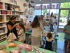 The Big Picture will offer unique and creative gifts, art kits, and pieces of art and design from local moms to artists all the way across the world. There will also be various crafting tables.