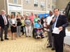  Tony Johnson and Sam Romeo speaking to the crowd at Saturday's ribbon-cutting ceremony.