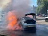 At approximately 11:18 a.m. on Thursday, dispatch received several calls about a car fire involving a Tesla behind the Blue Ginger restaurant on East Main Street.