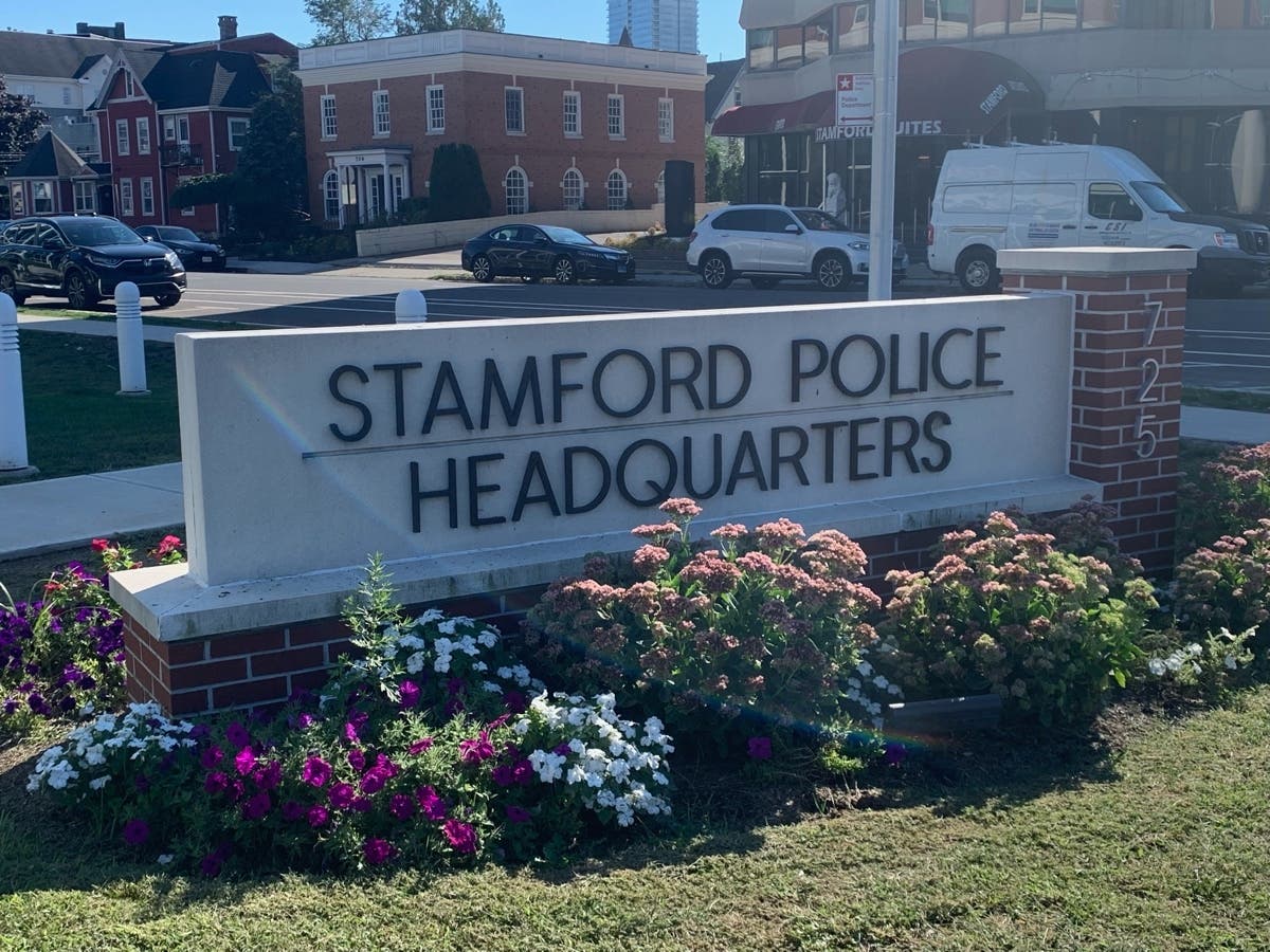 Shortly after 11 a.m., on Thursday, a fire broke out in the rear of a multi-family home on Selleck Street adjacent to Outpost Pizza on Stamford's West Side, according to to fire officials.