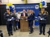 First Selectman Fred Camillo cuts the ribbon during the grand opening of the new GEMS Station 4 building on Nov. 9, 2022.