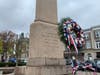 A ceremonial wreath sits at the base of the World War I monument in downtown Greenwich on Friday, Nov. 11, 2022.