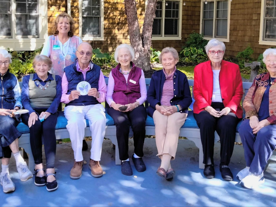 Atria Darien residents live a full life as they participate locally. Here, the Atria Darien Horticulture Club maintains native plants in the community's courtyard as part of being a site on the Darien Pollinator Pathway.