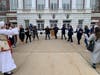 The crowd joined in on some traditional Greek dancing outside of Greenwich Town Hall Friday morning.