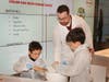 Members of Henkel’s research and development team led more than 30 students, ages 6-12, through hands-on sessions and science experiments last week.