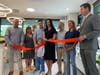 Dr. Inna Lazar cuts the ribbon to celebrate the grand opening of Pro Eye Care in Darien.