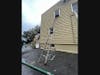 A neighbor placed a ladder underneath a woman's second-floor apartment window so she could escape, according to the Stamford Fire Department.