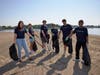 As part of a service initiative, more than 50 Synchrony employee volunteers teamed up with city park leaders in a beach cleanup across Clove Island Park, Cummings Park, and West Beach.