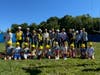 School and town officials behind a group of local students at Tuesday's groundbreaking ceremony of the Hindley, Holmes and Royle renovation projects.