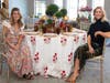 Molly Young and Jessica Bauers of BY Interiors with their Designed to Dine Tablescape.