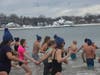 The event was held at Stamford’s Cove Island Park, where a lively crowd gathered to cheer on those who dared to take the plunge.  