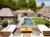 There is a pool house to compliment a heated pool.