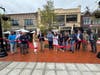 City officials and community members at Thursday's ribbon-cutting ceremony for the new public plaza at the intersection of Bedford Street and Forest Street