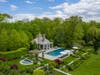 The property includes a stone pool house, a stone two-bedroom cottage with a kitchen, a one-bedroom cottage with a kitchen.