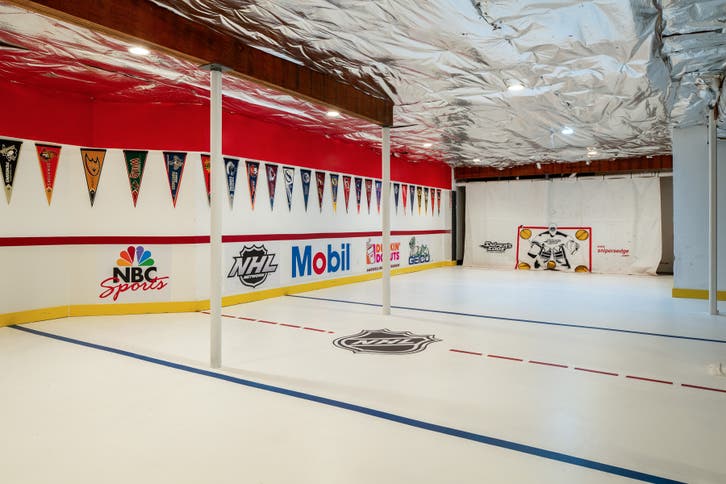$6.95M Greenwich Home Has Indoor Roller Hockey Area, Theater, Golf ...