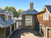 The property includes a heated four-car garage.