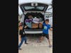 Reef & River Ruimy delivering goods to the Brevard County Sheriff's Office Animal Care Center.