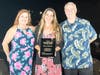 Ambassador Co-Chair April Vidal, Miss April's Dance (L) and Ambassador Chair Tom Grimes, Avatar Website Design (R) award Sherri Muldoon, WeCare Plumbing, Heating, Air, & Solar with Ambassador of the Year