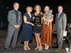 Board Members from Professional Women's Round Table accepting Non-Profit of the Year. L to R: Morris Myers (Emcee,) Cindy Warren, Sandy Word, Nikki Davis & son, and Adam Eventov (Emcee.)