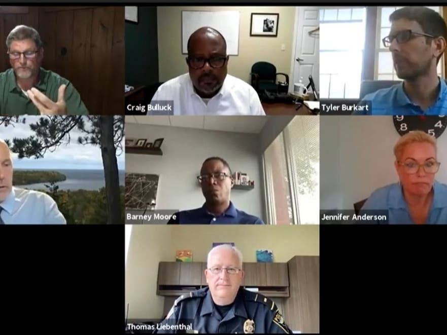 The new interim chief, Thomas Liebenthal, in the Aug. 27 meeting of the Shorewood Police Commission. In the upper left is board president Richard Cole. Below him is Attorney Steven Zach. 