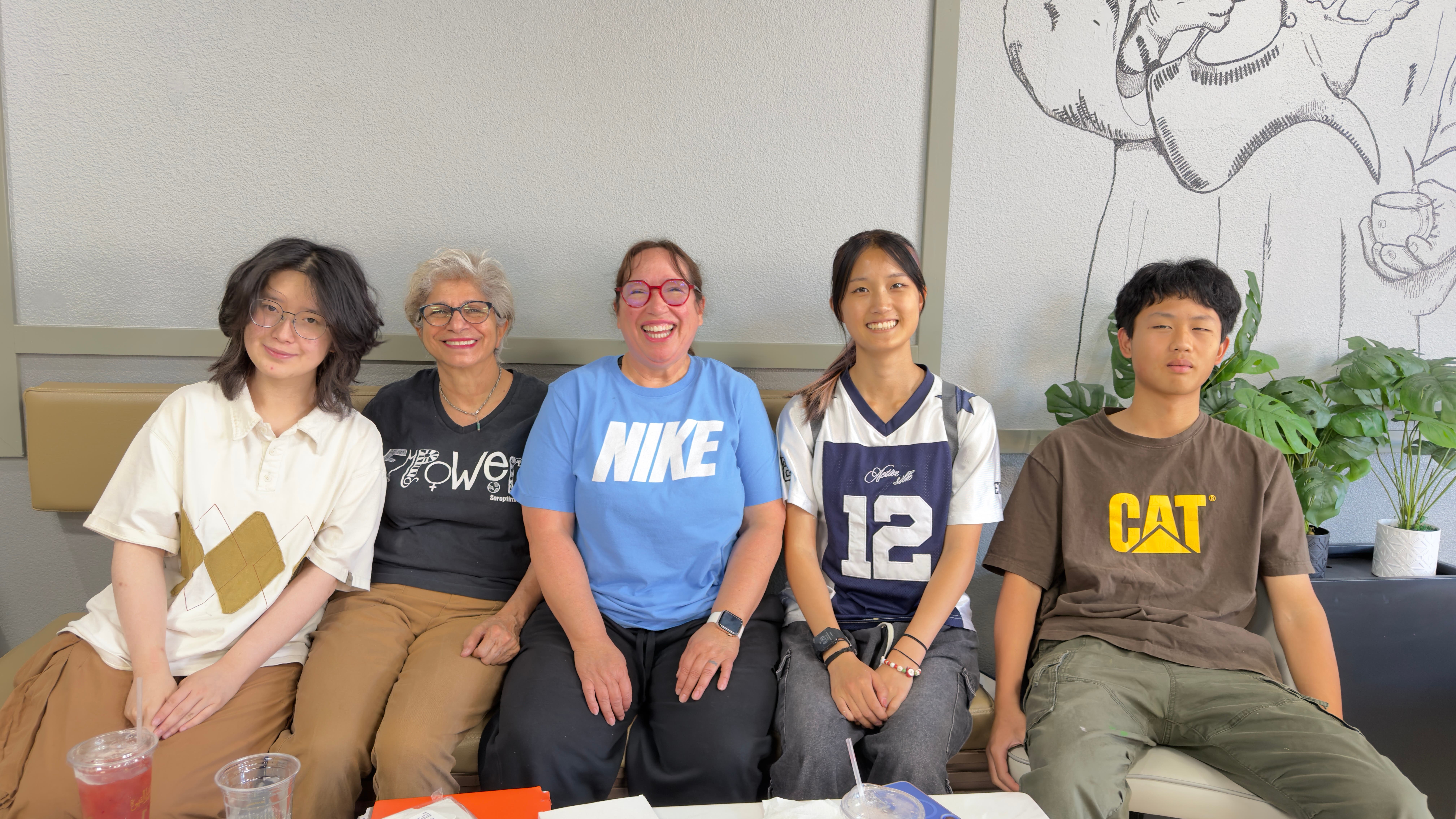 Group of smiling people seated