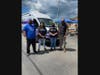 Cain Pope (President of Kiwanis Club of Greater Roxbury) with Hope One mobile unit's staff