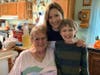 Joey (right) poses for a picture with his older sister, Kelcie, and his grandma, Neal. 