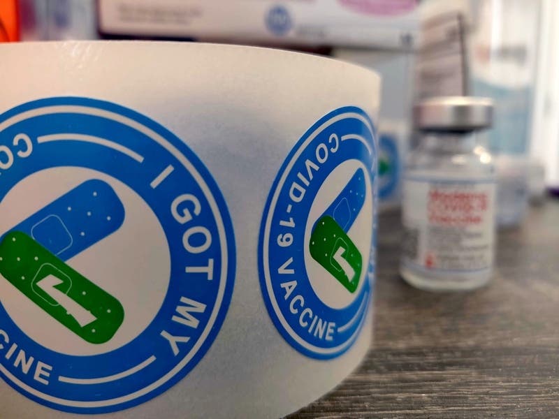 People choose between the Pfizer, Moderna or Johnson & Johnson vaccines at the Kane Vax Hub, located at 501 N. Randall St. in Batavia.