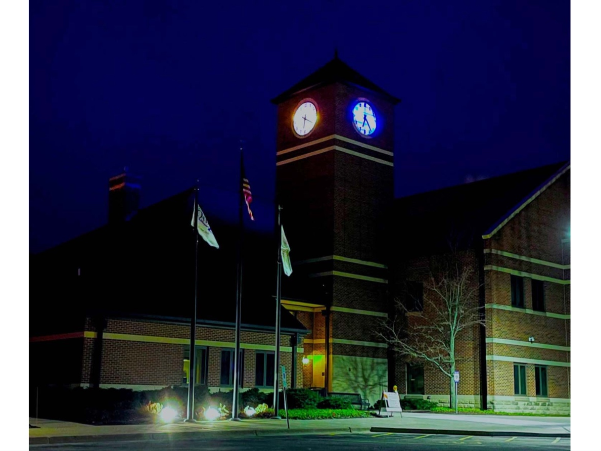 The clock tower, located at 100 Parkers Mill Place, started to be illuminated blue and yellow March 1.