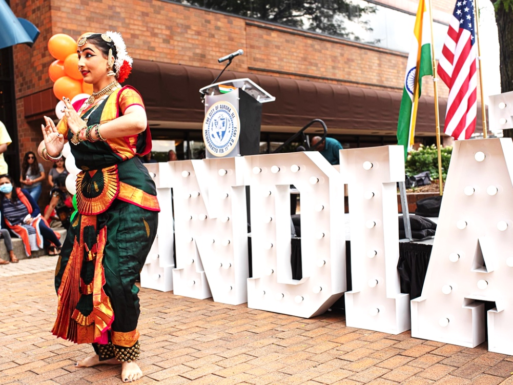 Ananya Saraswati, a student at Aurora’s Acharya Performing Arts Academy, performs a classical Indian dance in for the inaugural Indian flag-raising ceremony.