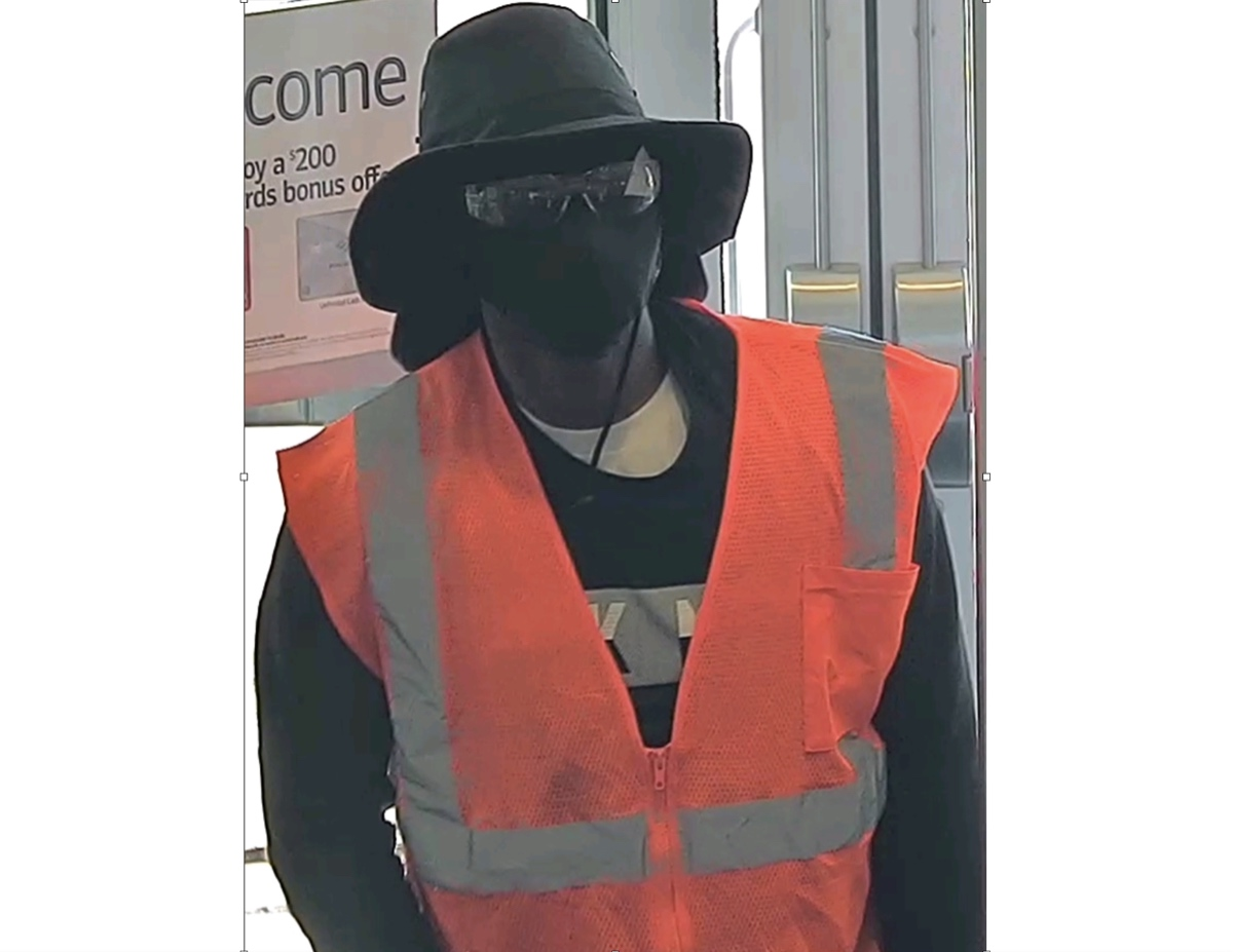 The suspect, described by the FBI as tall with a slim build, remains at large after the Tuesday afternoon robbery.