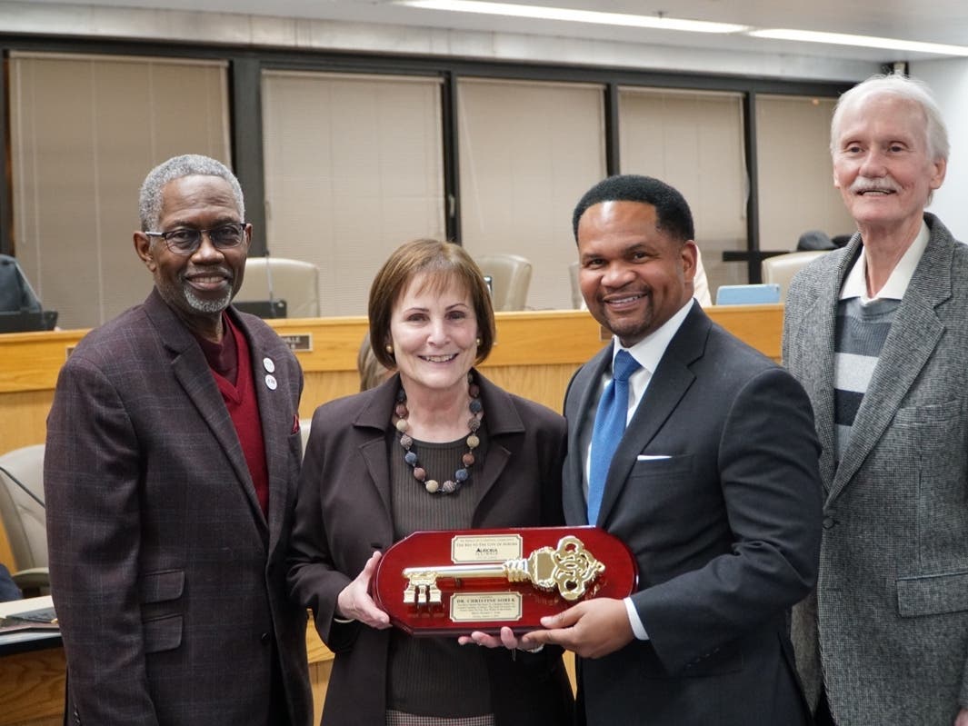 Mayor Richard Irvin presented Christine Sobek with a coveted Key to the City of Aurora during Tuesday night's City Council meeting.