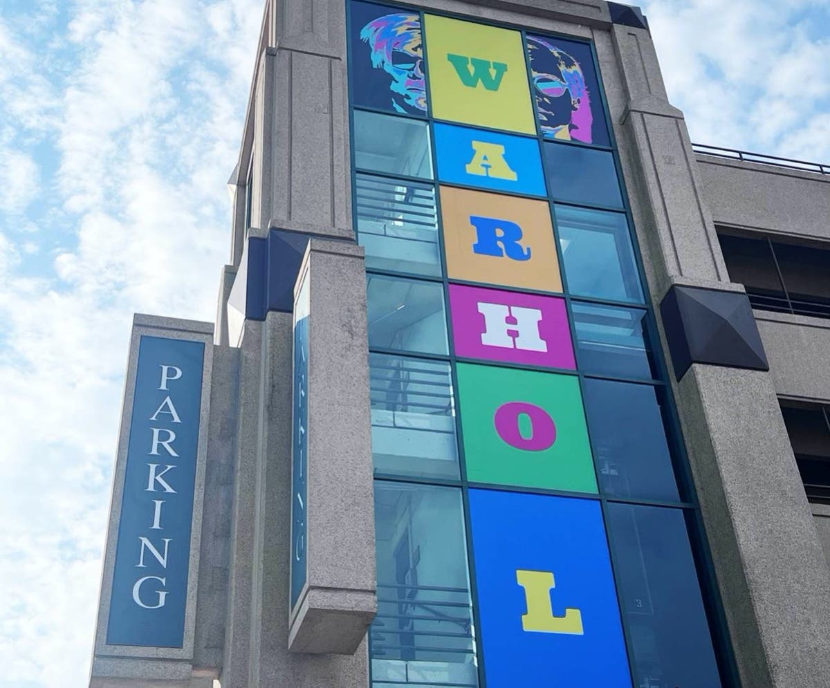 A new Warhol mural was installed on a main parking deck in downtown Aurora in preparation for the city’s Color Me Warhol Summer Experience.