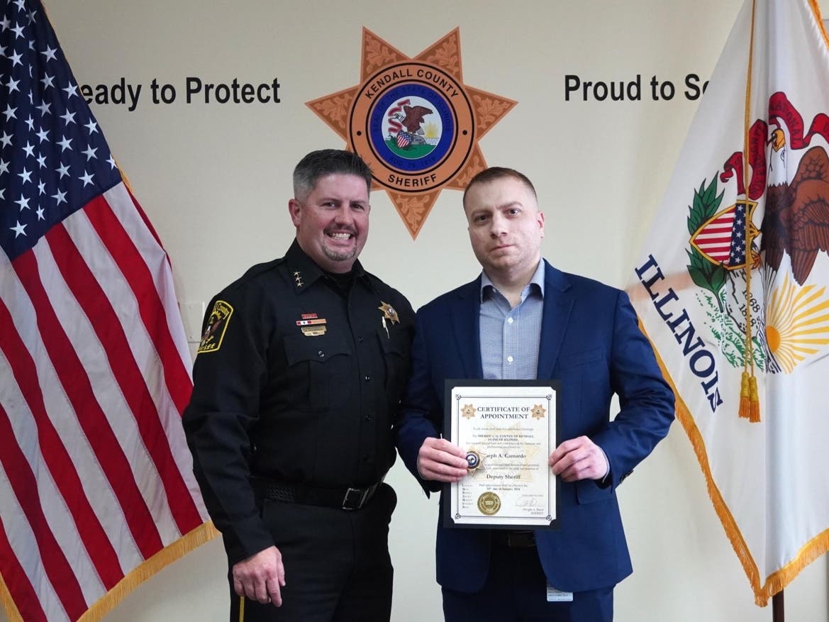 Joseph Camardo (right) was sworn in on Jan. 24 by Undersheriff Bobby Richardson.