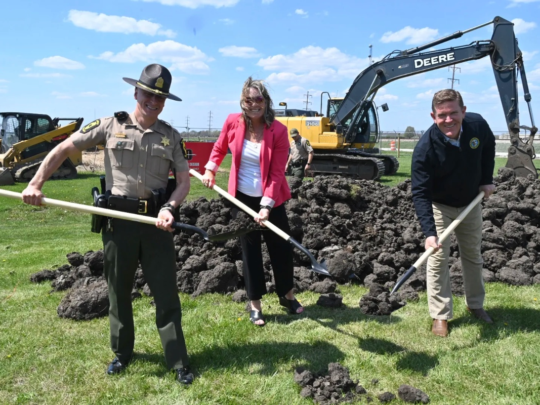 ISP Col. Chris Owen (from left), CDB Deputy Director of Construction Lisa Hennigh and ISP Director Brendan Kelly break ground on the new canine facility.